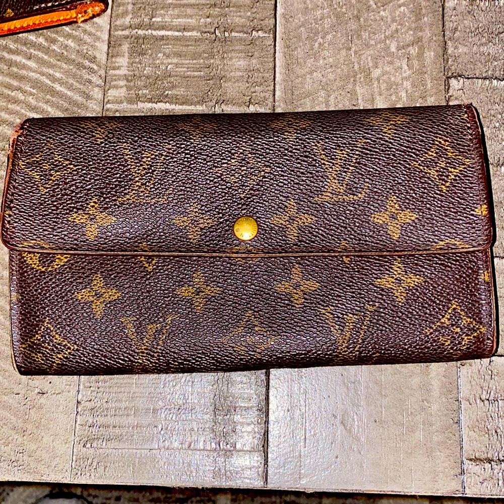 Authentic lv wallet / vintage but still a beauty .